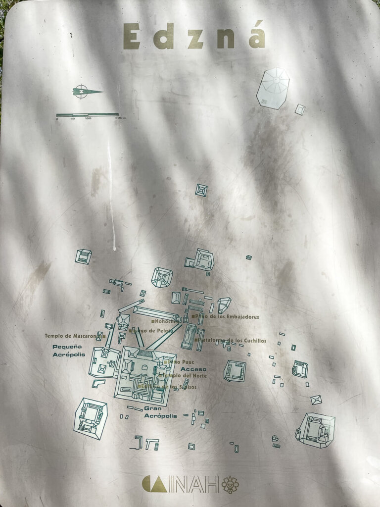 White map with green images and writing, rippled with shadows