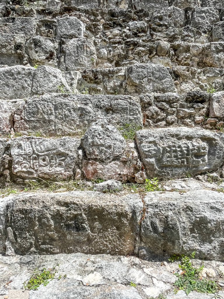 Ancient carvings in the stone steps of a pyramid