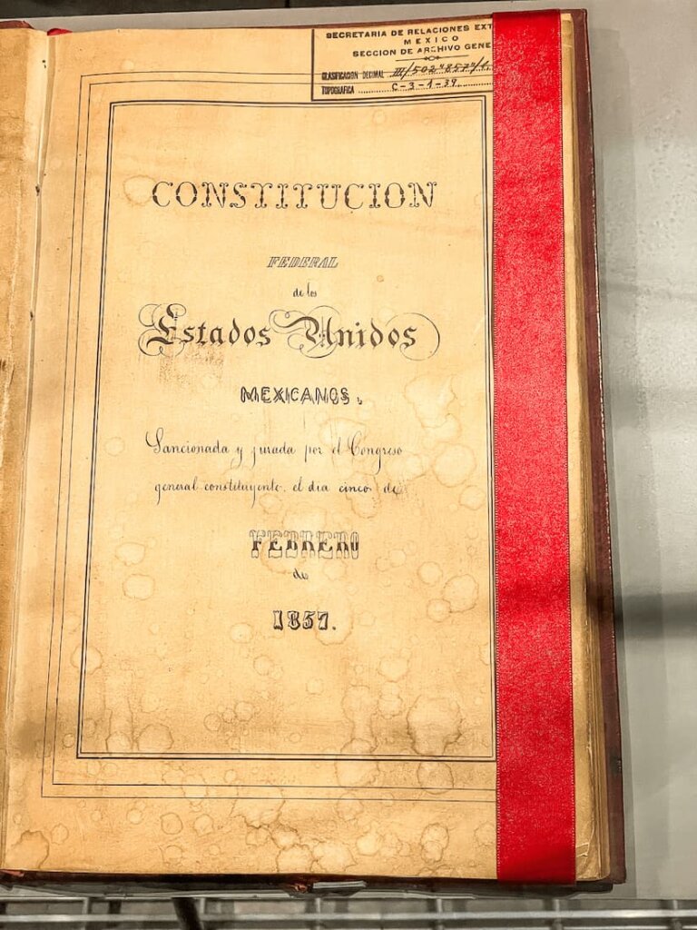 Title page of an old book, with a red stripe down the right side